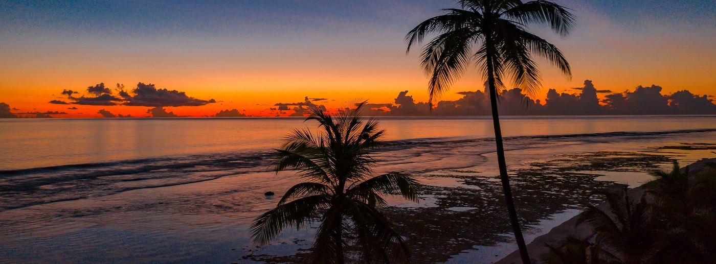 A luxury resort pool overlooking the Indian Ocean